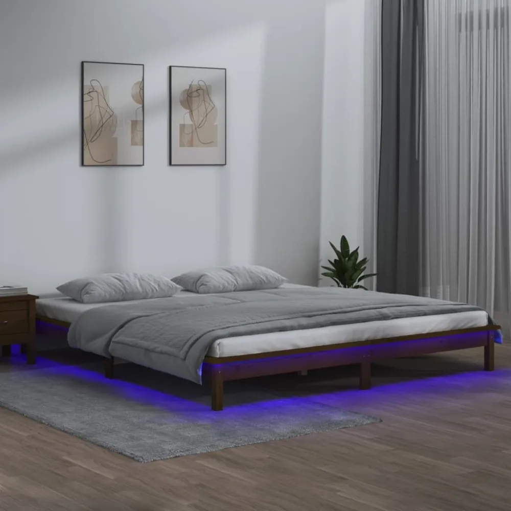 Bedframe LED massief hout honingbruin 140x200 cm