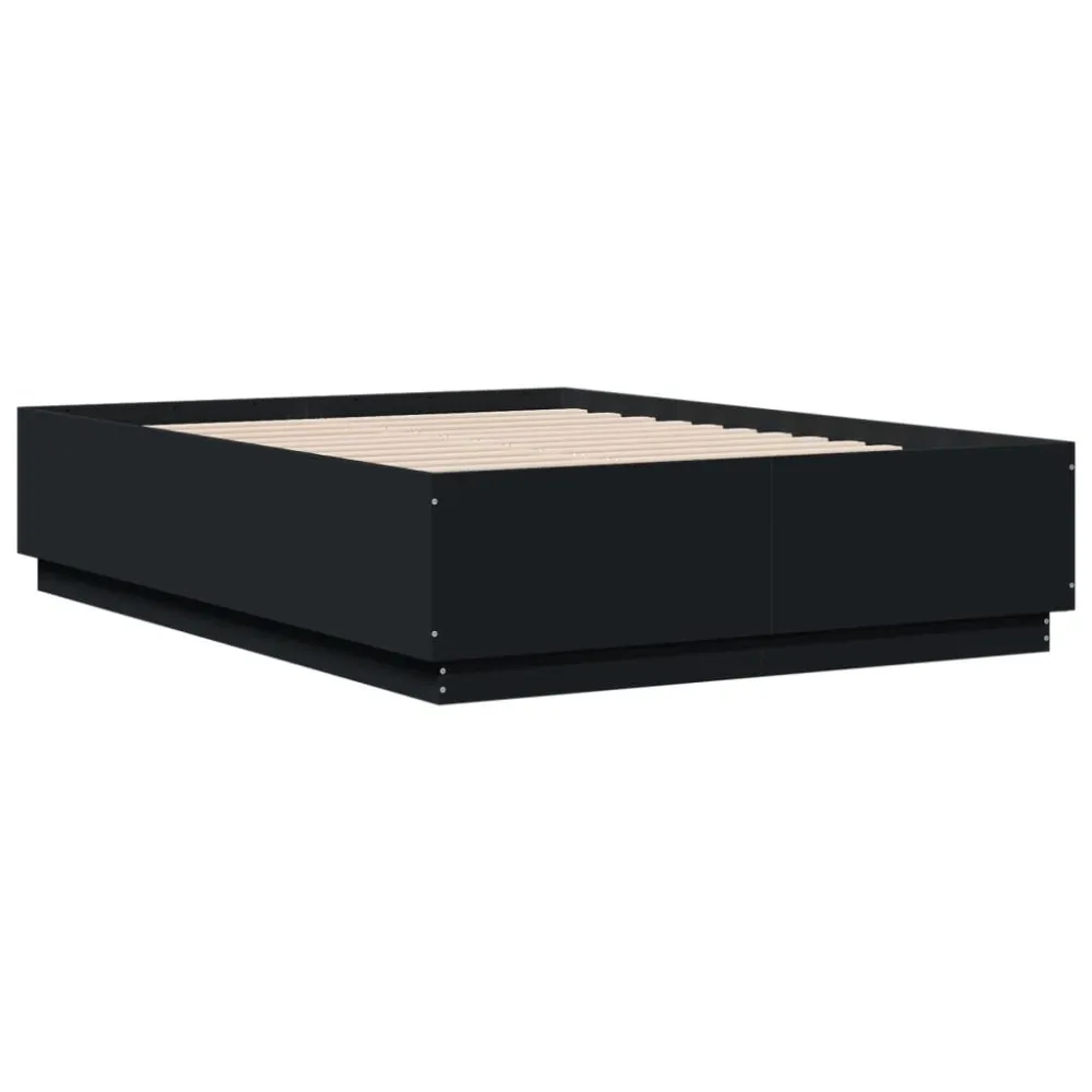 Bedframe LED massief hout zwart 140x190 cm