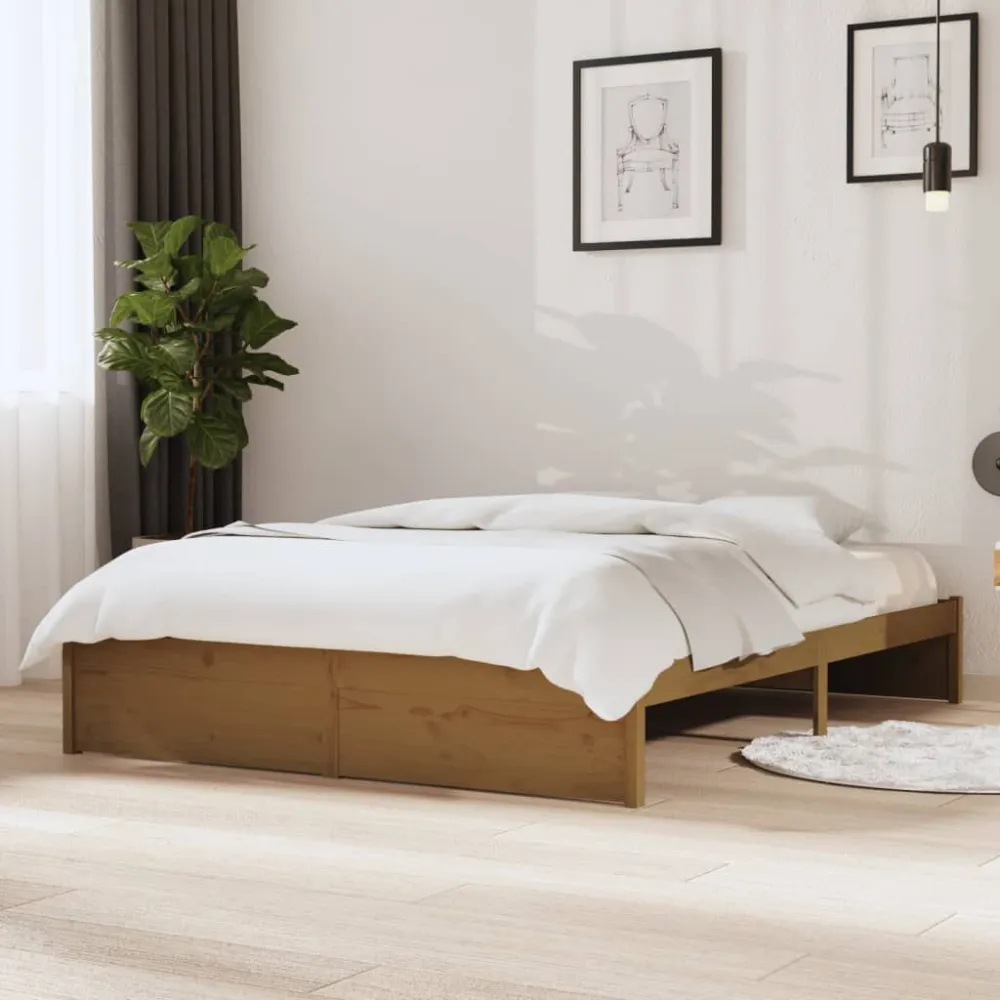 Bedframe massief hout honingbruin 135x190 cm