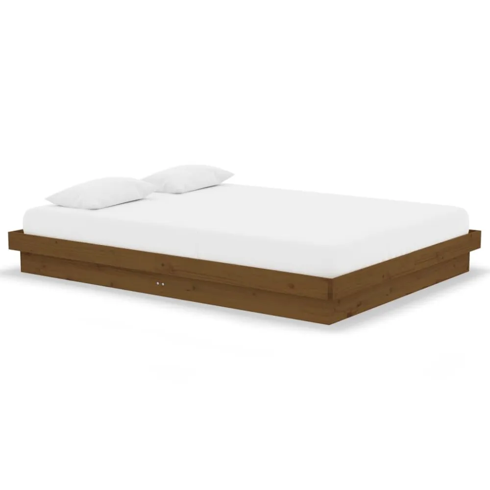 Bedframe massief hout honingbruin 135x190 cm