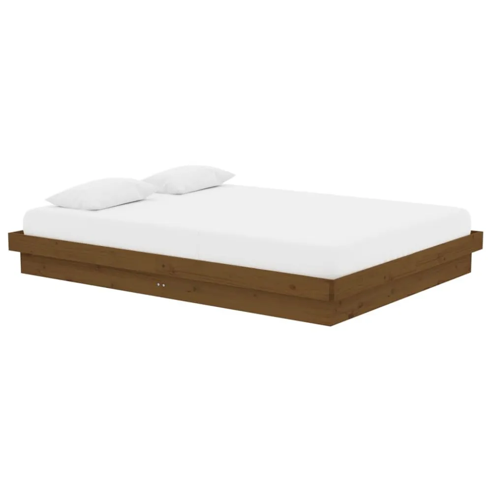 Bedframe massief hout honingbruin 135x190 cm