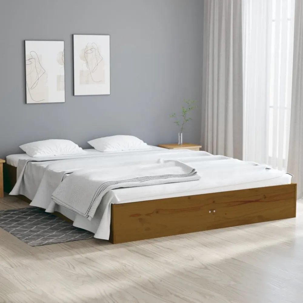 Bedframe massief hout honingbruin 135x190 cm