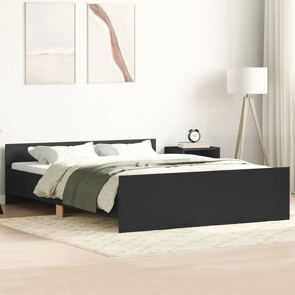 Bedframe met hoofd- en voeteneinde zwart 135x190 cm