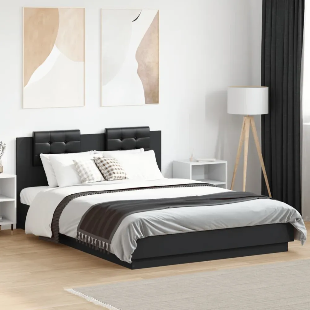 Bedframe met hoofdbord bewerkt hout zwart 140x200 cm