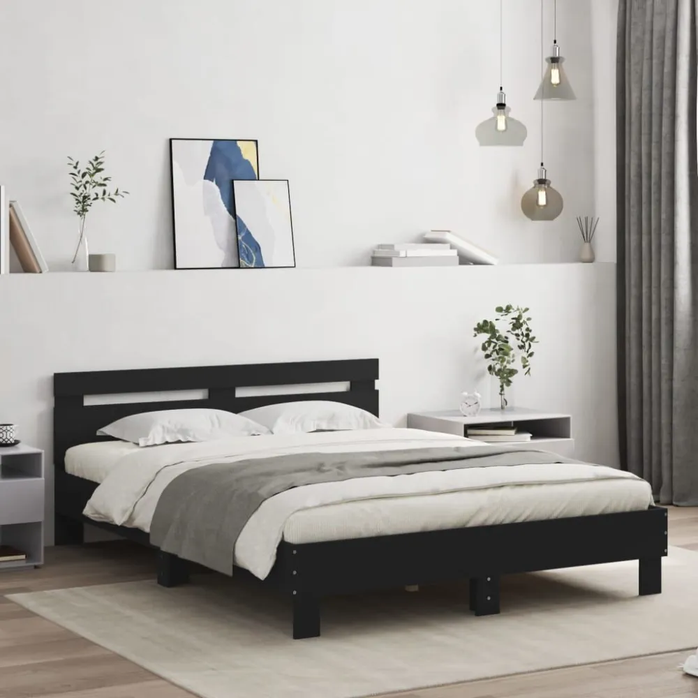 Bedframe met hoofdbord bewerkt hout zwart 140x200 cm