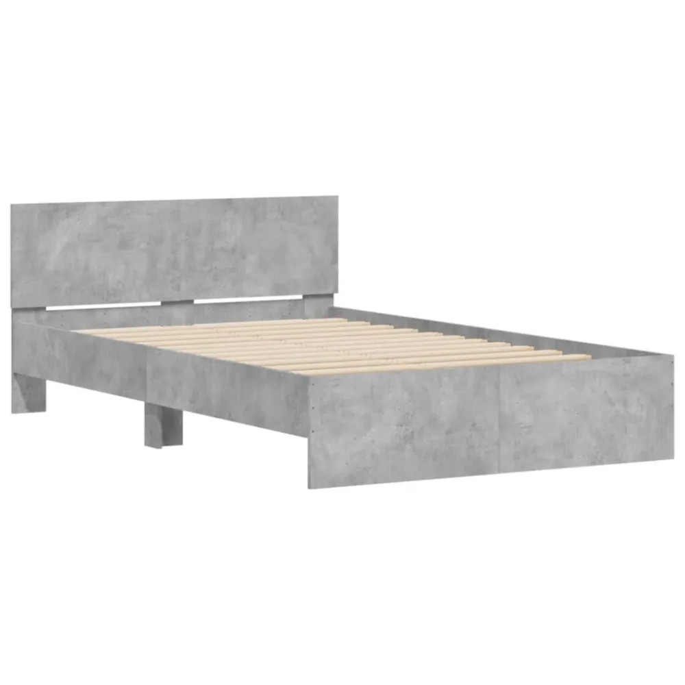 Bedframe met hoofdeinde betongrijs 120x200 cm