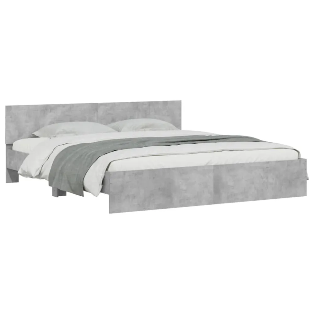 Bedframe met hoofdeinde betongrijs 180x200 cm