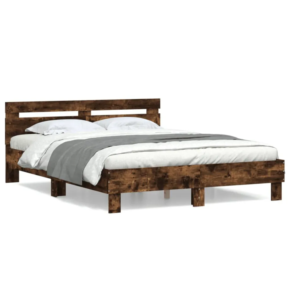 Bedframe met hoofdeinde bewerkt hout gerookt eiken 140x200 cm