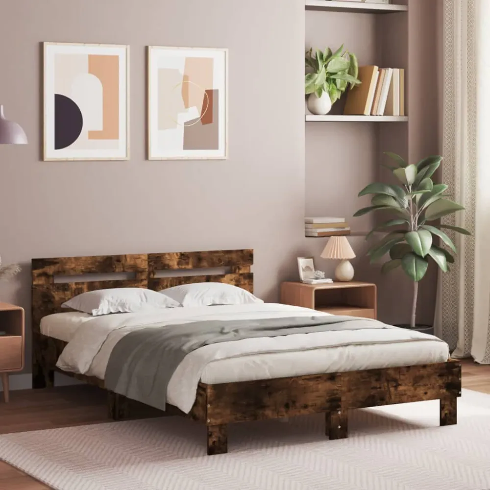 Bedframe met hoofdeinde bewerkt hout gerookt eiken 135x190 cm