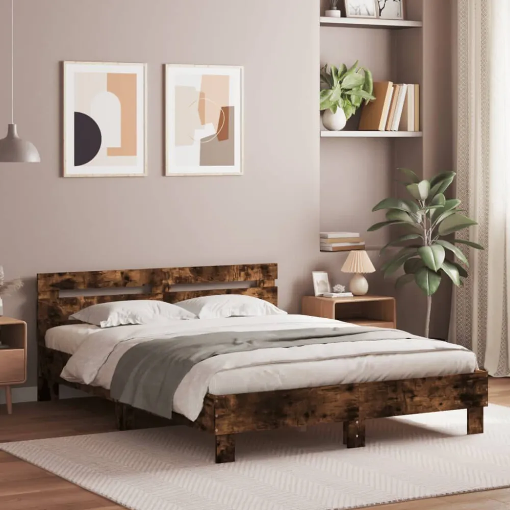 Bedframe met hoofdeinde en LED gerookt eikenkleurig 140x190 cm