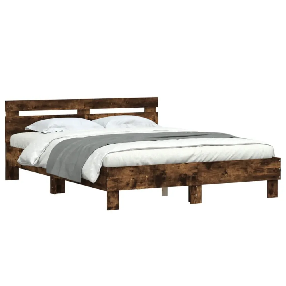 Bedframe met hoofdeinde en LED gerookt eikenkleurig 140x200 cm