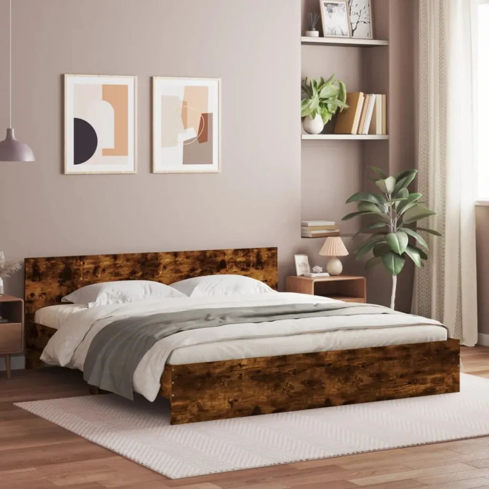 Bedframe met hoofdeinde en LED gerookt eikenkleurig 180x200 cm