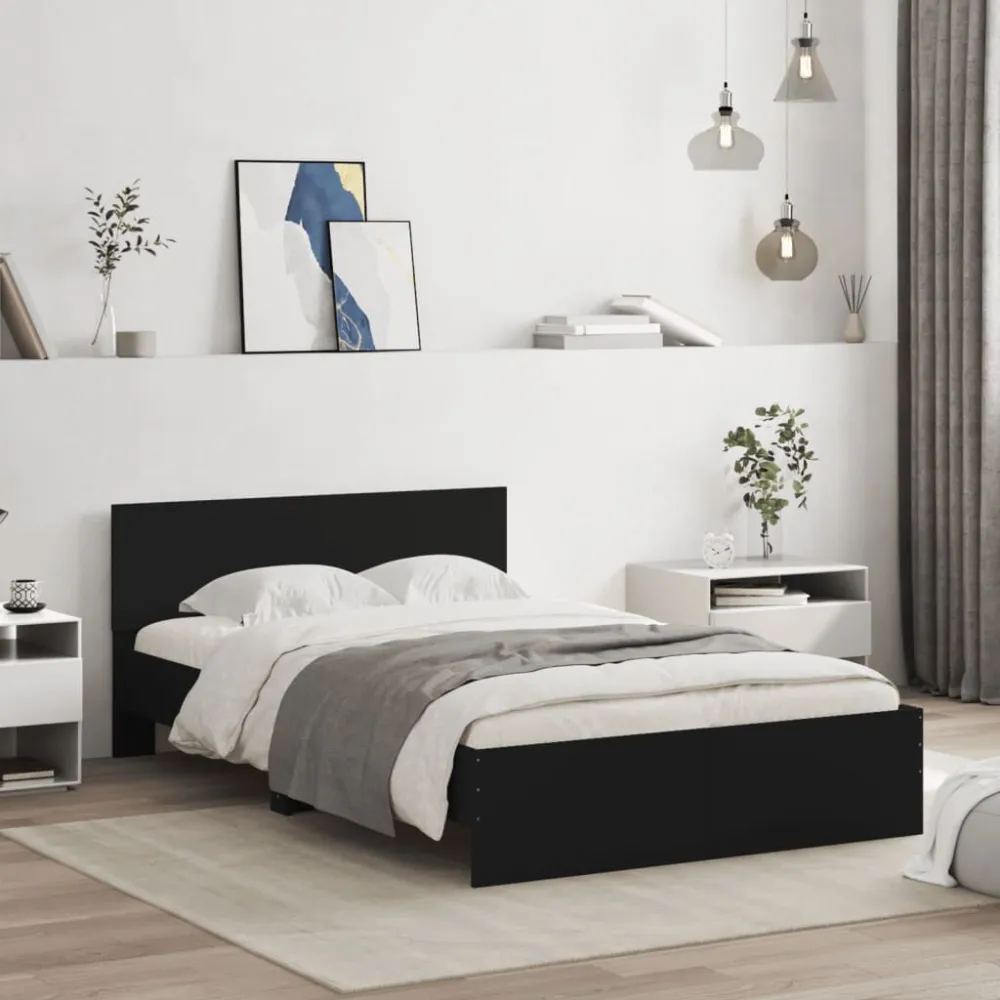 Bedframe met hoofdeinde en LED zwart 135x190 cm