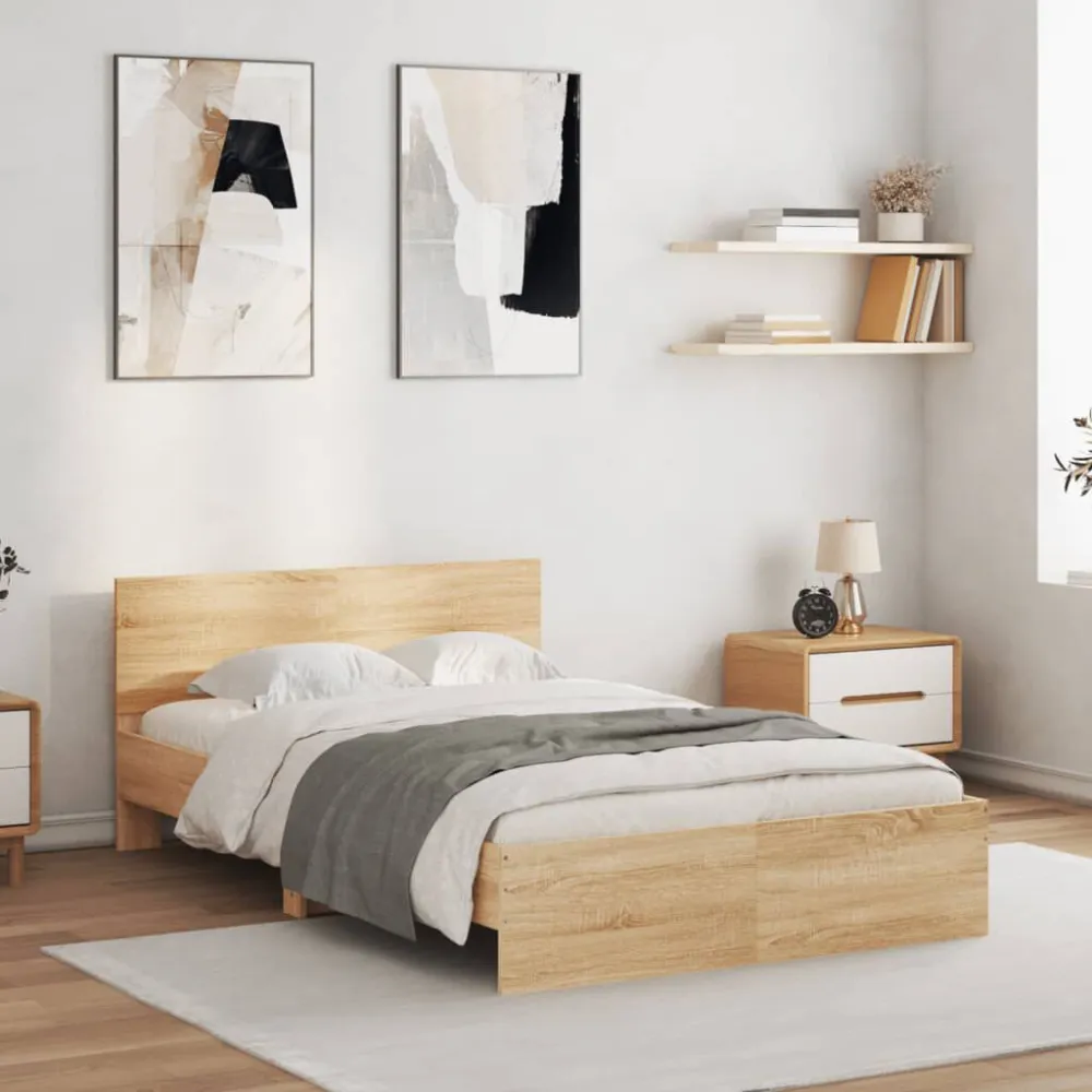 Bedframe met hoofdeinde sonoma eikenkleurig 135x190 cm