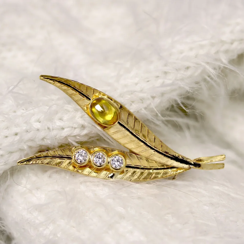 Double leaf gouden brooch