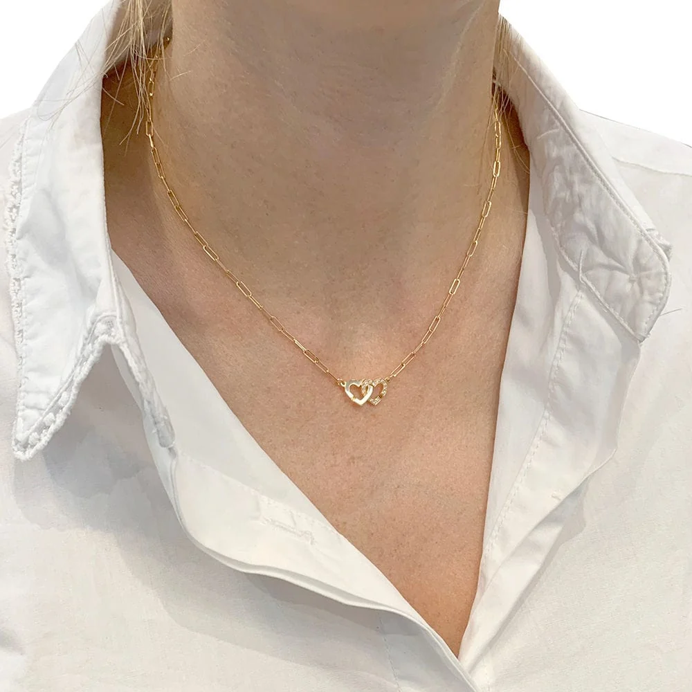 Necklace Dinh Van "Double Coeur" rose verguld, diamonds.