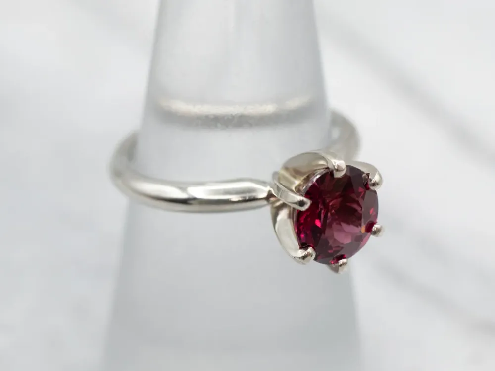 Sleek Two Tone Gold Rhodolite Garnet Solitaire Ring
