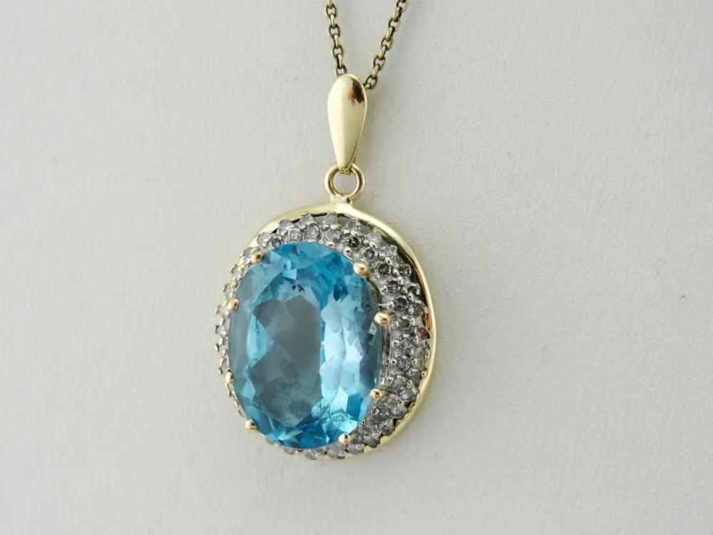 Stunning Blue Topaz Pendant Diamond Halo Two Tone Verguld