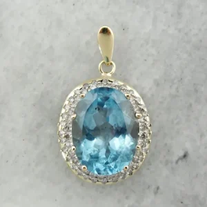 Stunning Blue Topaz Pendant Diamond Halo Two Tone Gouden