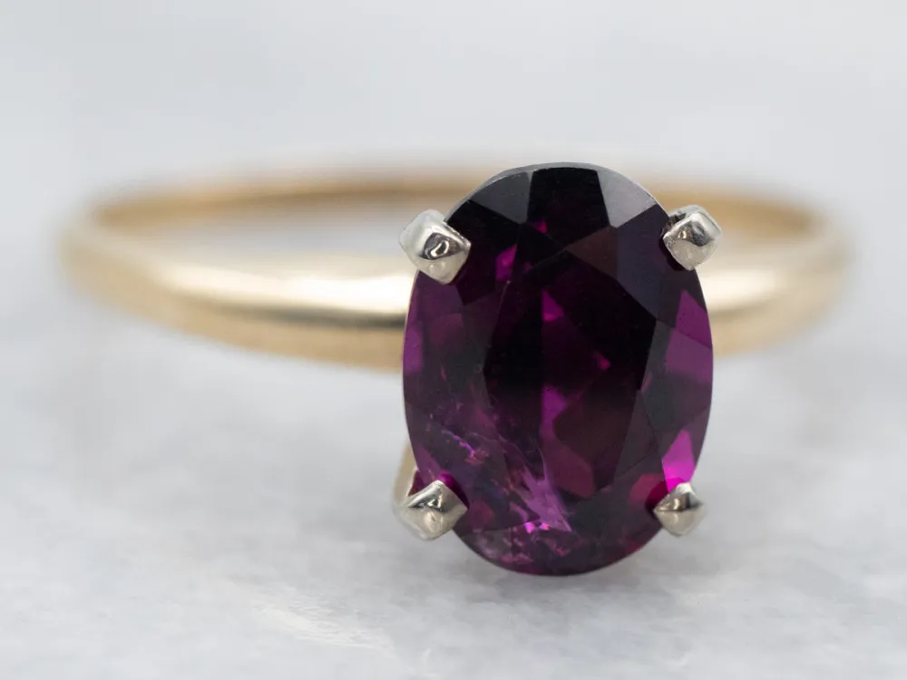 Two Tone Oval Cut Rhodolite Garnet Solitaire Ring