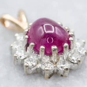 Two Toned Ruby Cabochon and Diamond Halo Pendant