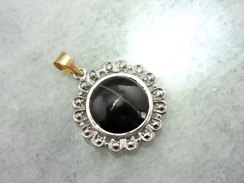 Silver and Verguld Cat's Eye and Marcasite Pendant