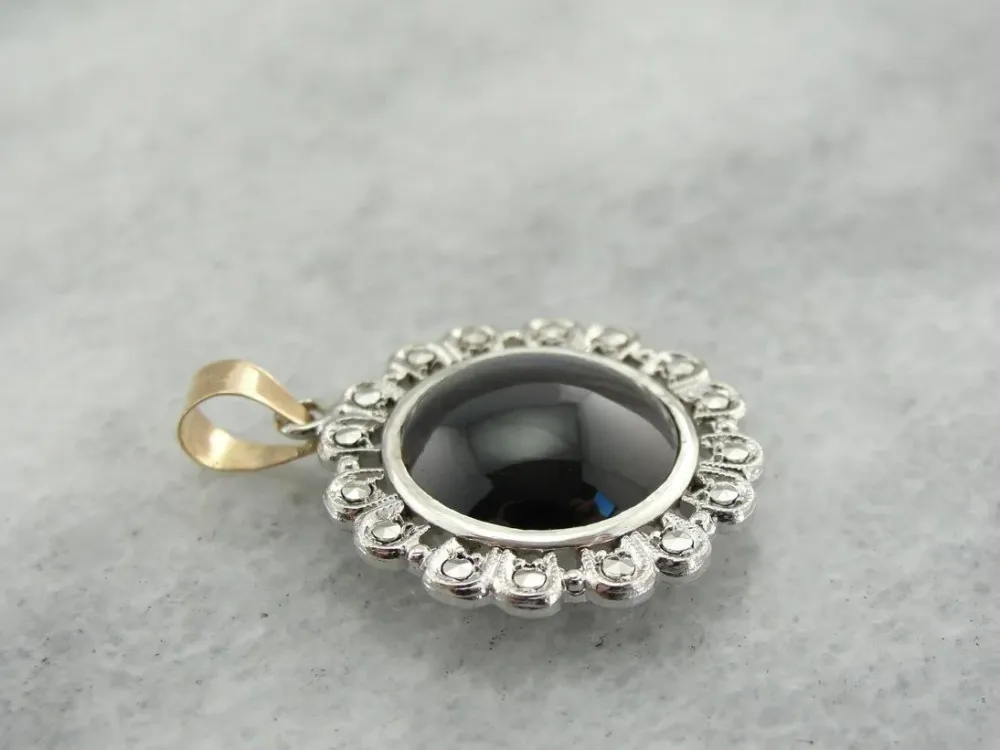 Silver and Verguld Cat's Eye and Marcasite Pendant