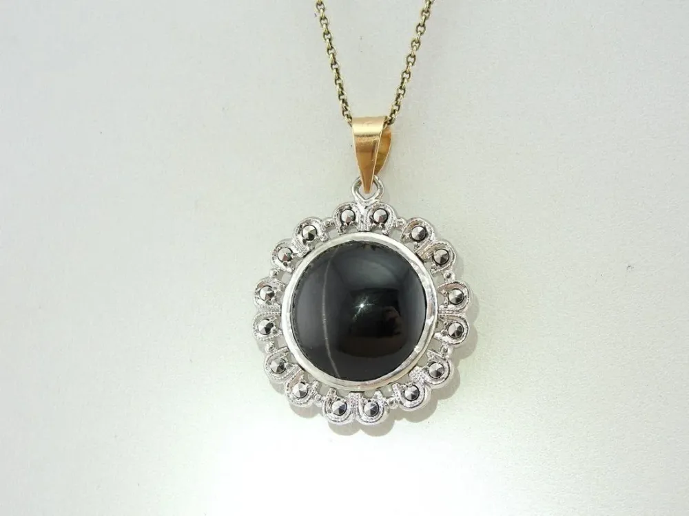 Silver and Verguld Cat's Eye and Marcasite Pendant